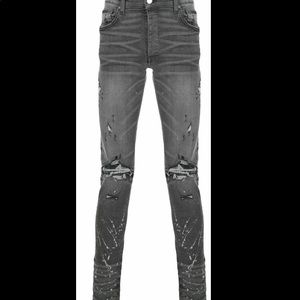 Amiri Denim Distressed Skinny Jeans in Grey